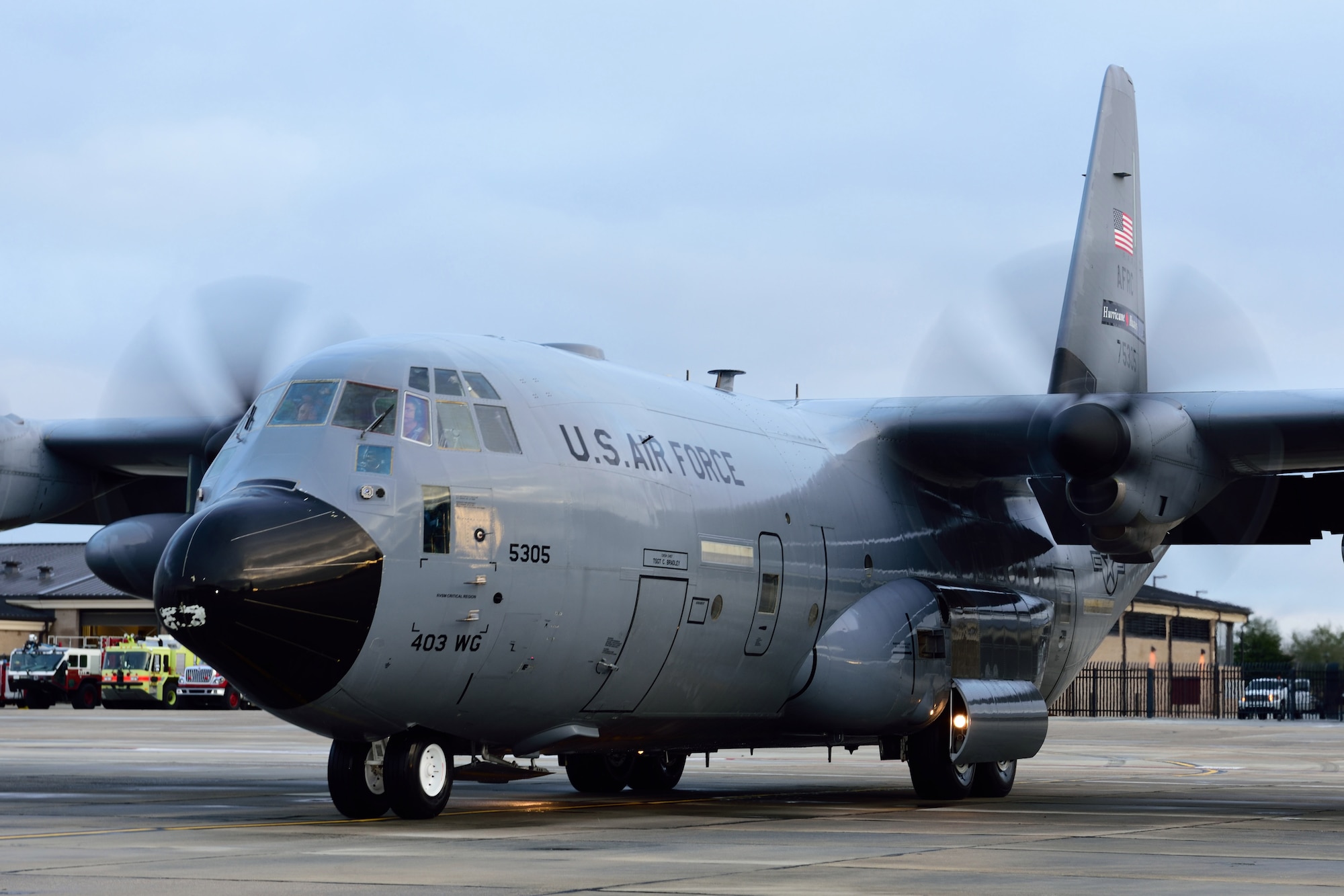 Aircrew members from the 53rd Weather Reconnaissance Squadron “Hurricane Hunters” taxi a WC-130J Super Hercules aircraft to its parking spot on the runway at Keesler Air Force Base, Mississippi, after a winter storm flight Jan. 12, 2018. In addition to their hurricane taskings, Hurricane Hunters fly winter storm missions to gather weather data used by forecasters in generating models for systems that could affect the East, West or Gulf Coast of the United States. (U.S. Air Force photo by Tech. Sgt. Ryan Labadens)