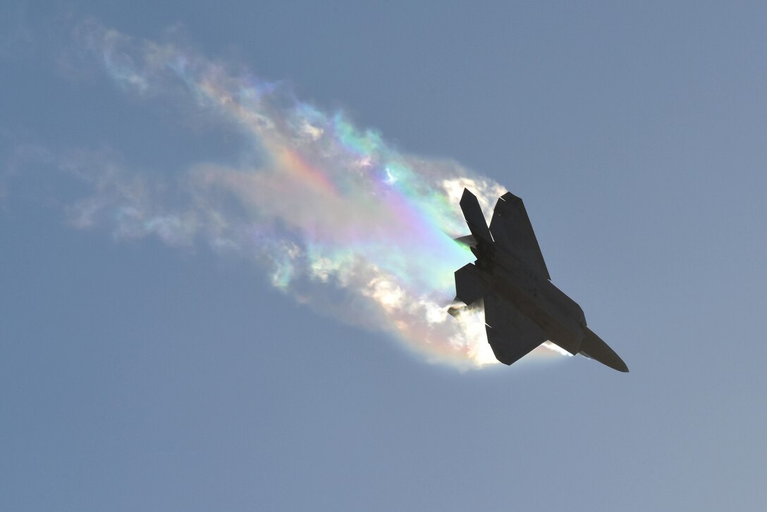 A U.S. Air Force F-22 Raptor banks left causing vapor contrails during an aerial demonstration at the Australian International Airshow and Aerospace and Defense Exposition (AVALON) March 3, 2017, in Geelong, Australia. The F-22 is assigned to the 90th Fighter Squadron at Joint Base Elmendorf-Richardson, Alaska, and is part of the F-22 Demonstration Team from Joint Base Langley Eustis, Va. AVALON 2017 was an ideal forum to showcase U.S. defense aircraft and equipment. (U.S. Air Force photo/Master Sgt. John Gordinier)