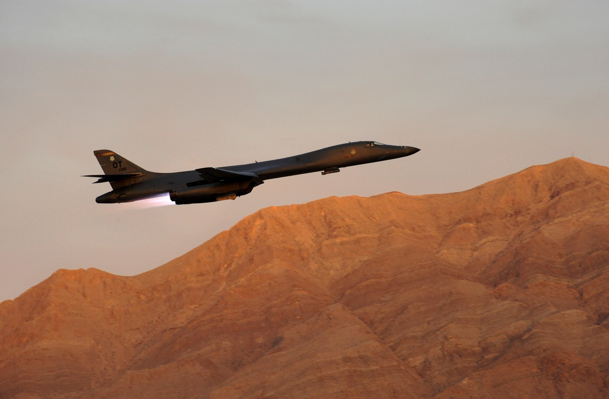 A B-1 Lancer strategic bomber takes off from Nellis Air Force Base, Nev., during a training mission supporting the Weapons Instructor Course, June 8, 2017. (U.S. Air National Guard photo by Master Sgt. John Hughel)