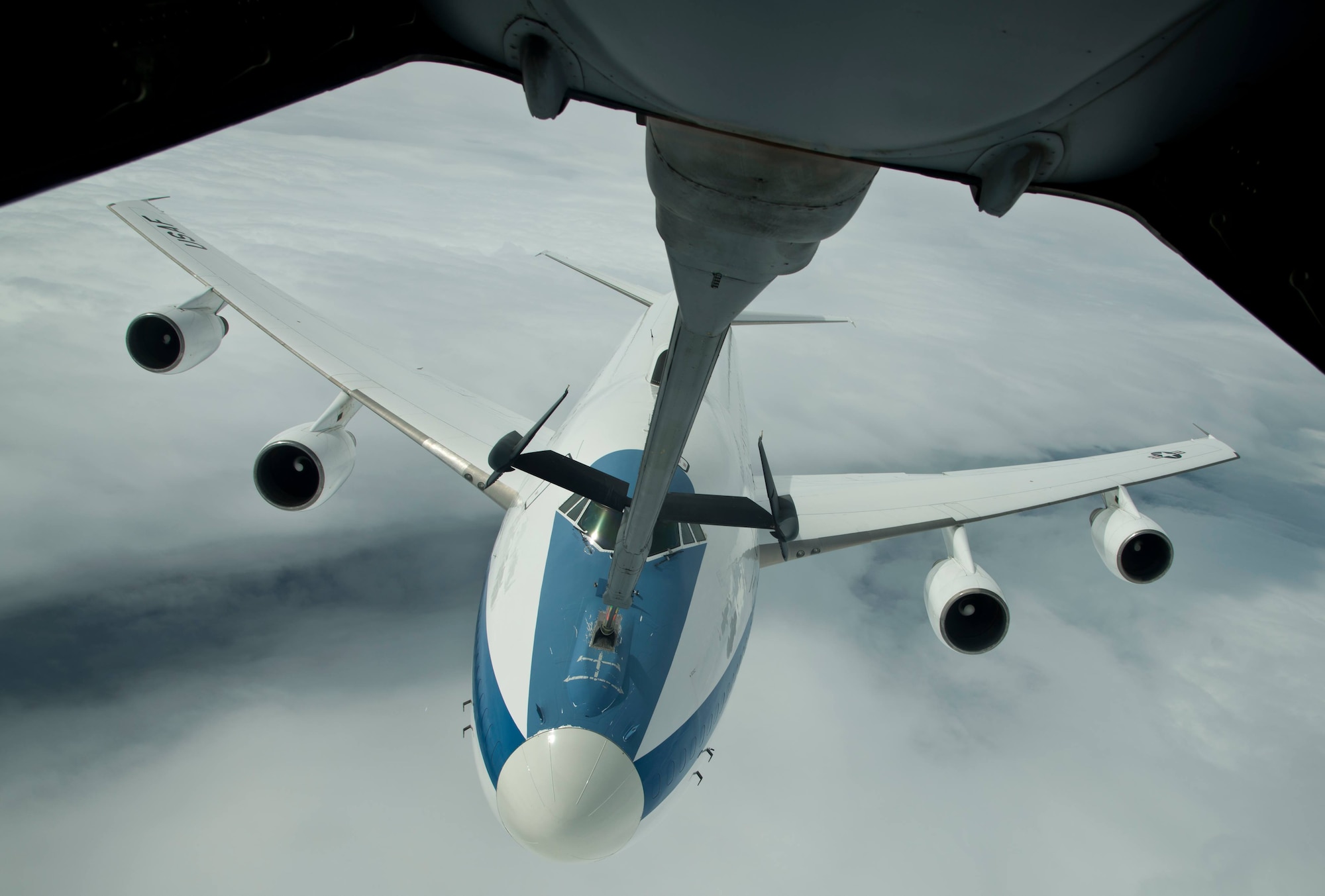 An E-4B from Global Strike Command, Barksdale Air Force Base, La., is refueled by a KC-10 Extender from Travis AFB, Calif., during a local mission June 12, 2017. In case of national emergency or destruction of ground command and control centers, the E-4B provides a highly survivable command, control and communications center to direct U.S. forces, execute emergency war orders and coordinate actions by civil authorities. (U.S. Air Force photo by Staff Sgt. Nicole Leidholm)