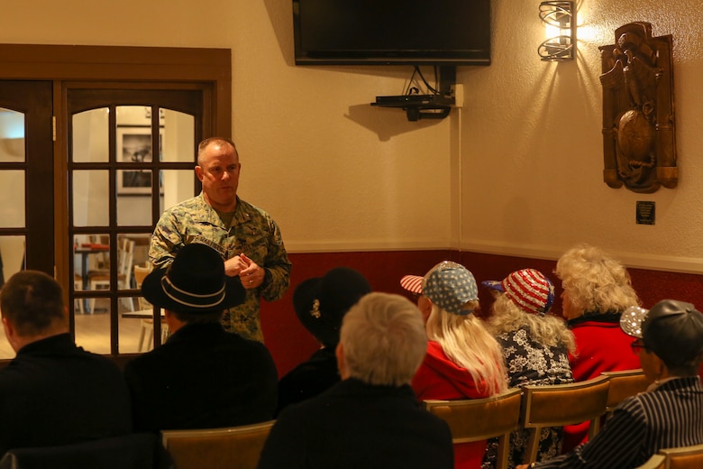 Lt. Col. Larry Warfield, assistant chief of staff, Marine Corps Community Services, speaks during a dedication ceremony for a sculpture by Claudio D’Augustino at the Officers’ Club aboard the Marine Corps Air Ground Combat Center, Twentynine Palms, Calif., Jan. 9, 2018. The sculpture was donated to the Combat Center during the ceremony to express D’Augustino’s appreciation for members of the armed services. (U.S. Marine Corps photo by Lance Cpl. Isaac Cantrell)