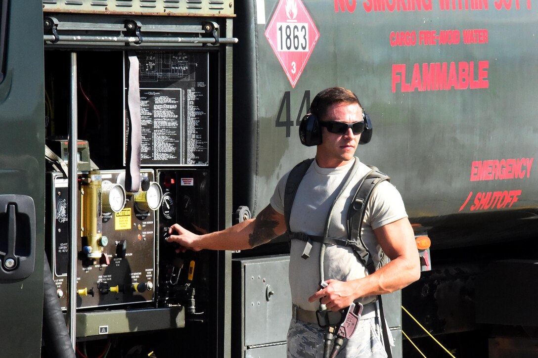 Air Force Staff Sgt. Brandon Tinges refuels an F-15C Eagle fighter aircraft during Sentry Aloha 18-01.