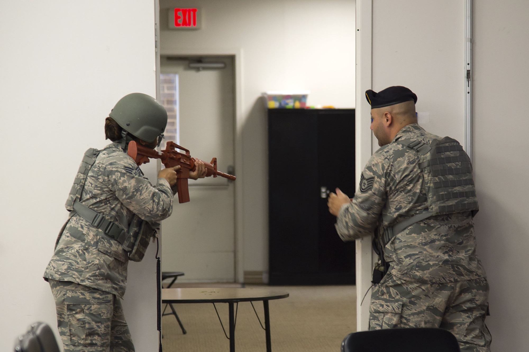 Airmen from the 6th Security Forces Squadron clear out a room during an active shooter exercise at MacDill Air Force Base, Fla., Jan. 9, 2017. Per Air Force instructions, two active shooter exercises must be held a year to train emergency responders on how to effectively react to unpredictable situations and save lives.