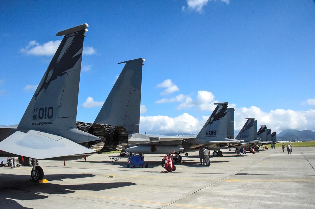 Guardsmen prep their F-15C Eagles fighter aircraft before participating in Sentry Aloha 18-01.