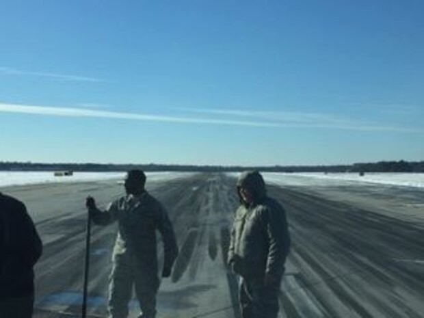 Joint Base Charleston personnel working to clear the airfield's runways Jan. 5-6 after historic winter storm Grayson dumped up to 6 inches of snow on the installation Jan. 3, 2018.