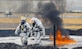 U.S. Air Force firefighters from the 355th Civil Engineer Squadron walk away from igniting a fire during an aircraft rescue firefighting training exercise at Davis-Monthan Air Force Base, Ariz., Jan. 10, 2018. Firefighters from the 355th CES practice these exercises regularly to hone their skills in preparation for the possibility of an aircraft fire. (U.S. Air Force photo by Airman 1st Class Michael X. Beyer)