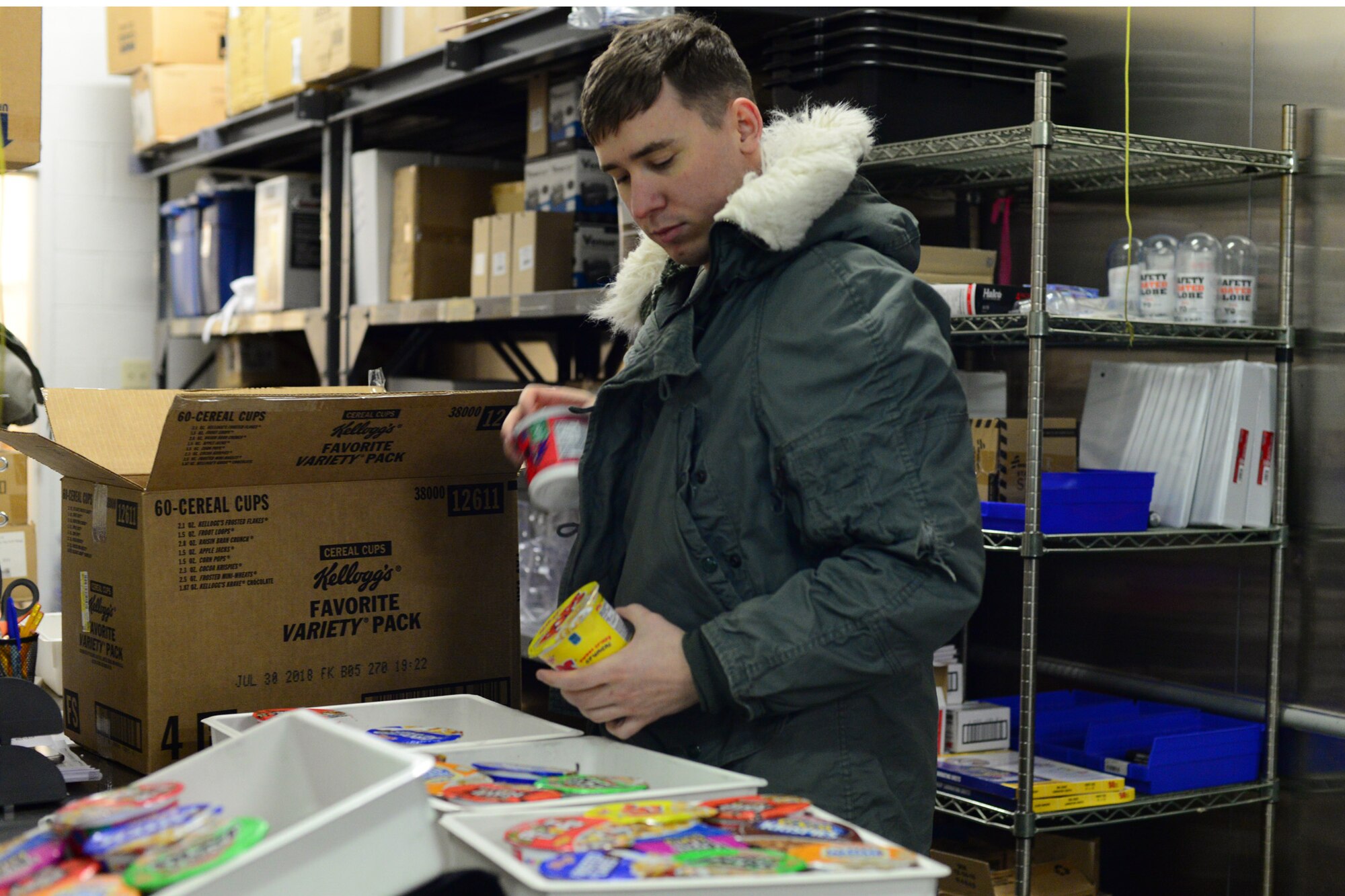 Airman 1st Class Austin Wetuski, 341st Force Support Squadron accountant and store clerk, separates cereal bowls to be sent out to individual missile alert facilities Jan. 12, 2018, at Malmstrom Air Force Base, Mont.