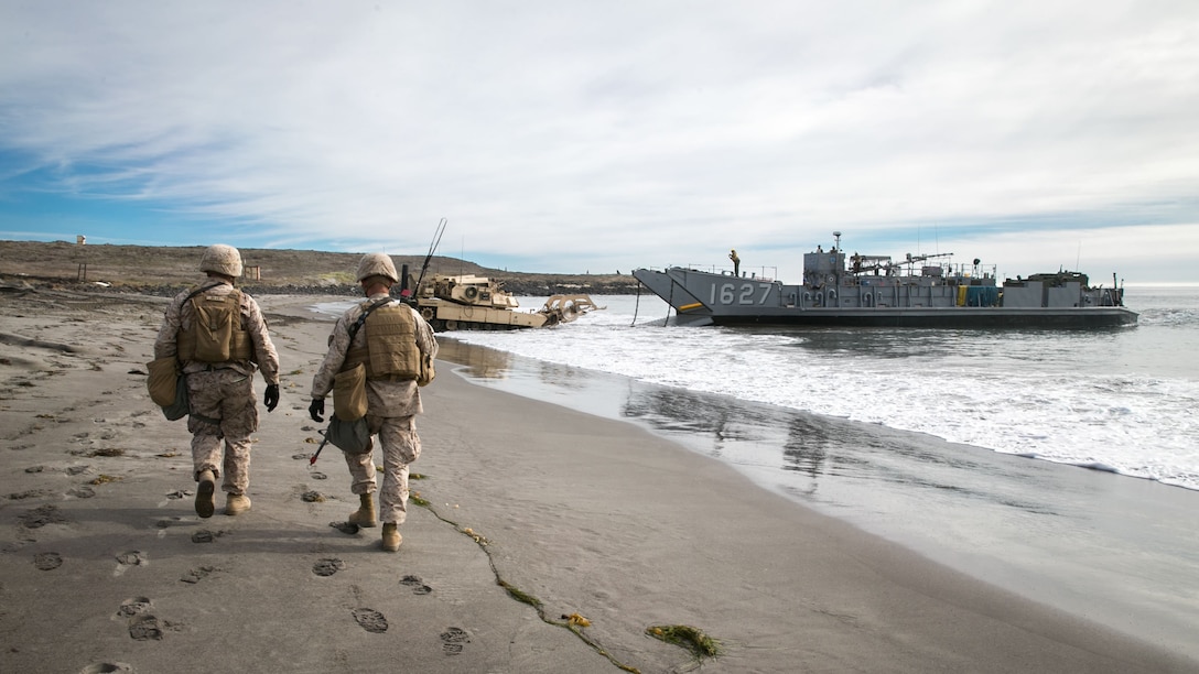 U.S. Marines with 1st Combat Engineer Battalion, 1st Marine Division, observe a beach after a simulated amphibious breach in support of exercise Steel Knight 2018 at San Clemente Island, Calif., Dec. 9, 2017.