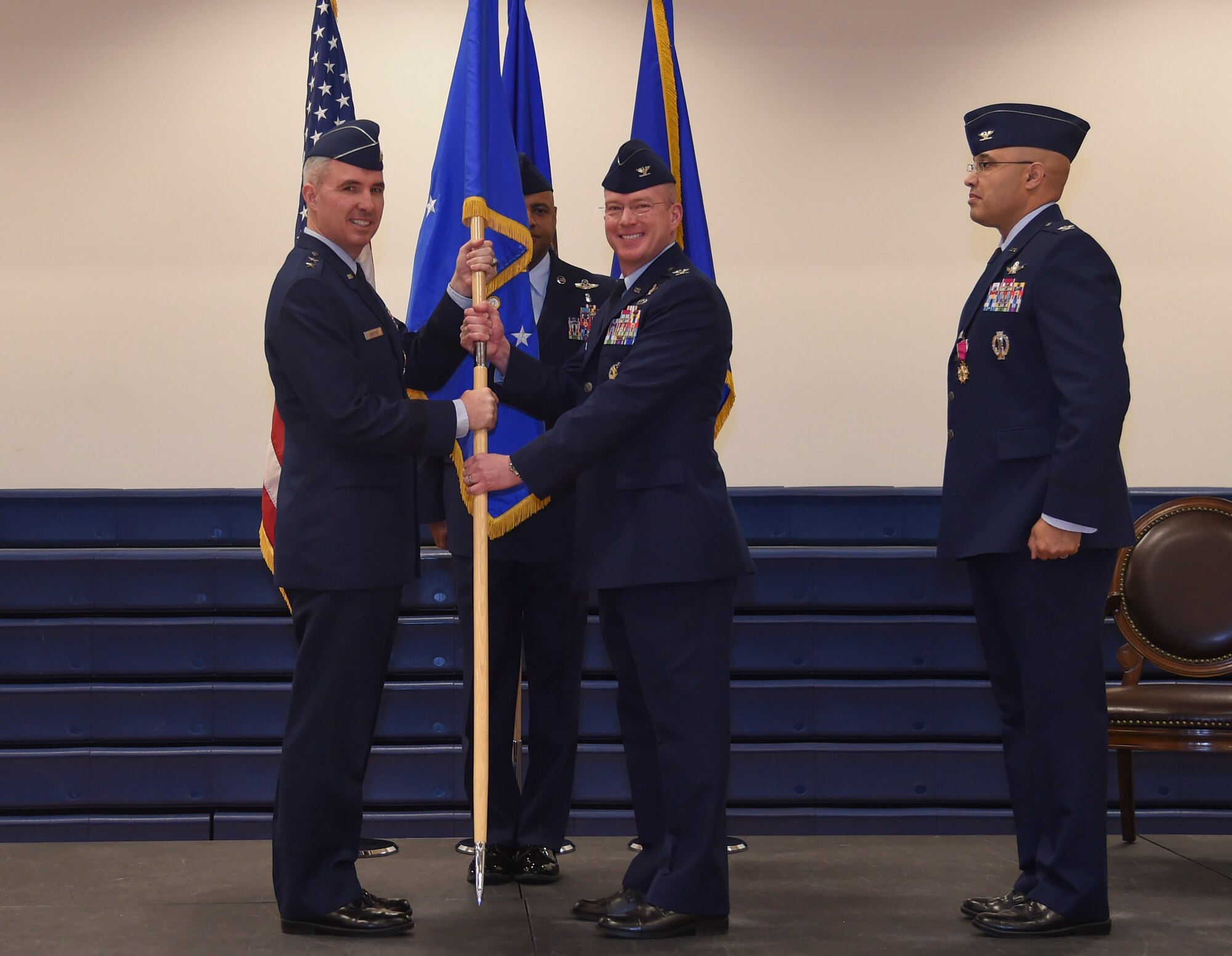 Receiving the guidon symbolizes the acceptance of responsibility Endicott will take as he becomes the newest commander of the 460th Space Wing. (U.S. Air Force photo by Airman 1st Class Holden S. Faul)