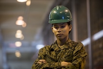 The Marine Corps Association and Foundation honored Cpl. Nelfi Tineoferreiras as its Marine of the Year 2017 Jan. 12, 2018, at the Butler Officer's Club, Camp Foster, Okinawa, Japan.  Tineoferreiras, the noncommissioned officer-in-charge of Receiving Section, Combat Logistics Regiment 35, 3rd Marine Logistics Group,  and native of the Dominican Republic was nominated to be the MCA&F Marine of the Year 2017 for her outstanding performance, some of which included her technical proficiency, dedication to her duties and demonstration of the Marine Corps' core values. (U.S. Marine Corps photo by Lance Cpl. Joshua Pinkney)