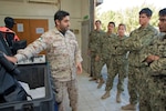 180107-N-XE158-0094 Mohammed Al-Ahmad Naval Base, KUWAIT (Jan. 7, 2018) U.S. Navy explosive ordnance disposal technicians, assigned to Commander, Task Group 56.1, and Kuwait Naval Force explosive ordnance disposal technicians participate in complete range autonomous breathing equipment training as part of exercise Eager Response 18. Eager Response 18 is a bilateral explosive ordnance disposal military exercise between the State of Kuwait and the United States. The exercise fortifies military-to-military relationships between the Kuwait Naval Force and U.S. Navy, advances the operational capabilities of Kuwaiti and U.S. forces to operate in the maritime domain, and enhances interoperability and warfighting readiness. (U.S. Navy photo by Mass Communication Specialist 1st Class Louis Rojas/Released)