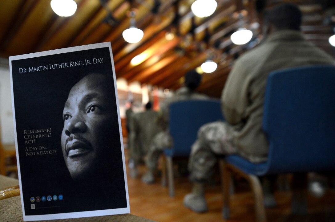 Service members gathered and listen to speeches at the Enduring Faith Chapel to celebrate Martin Luther King Day.