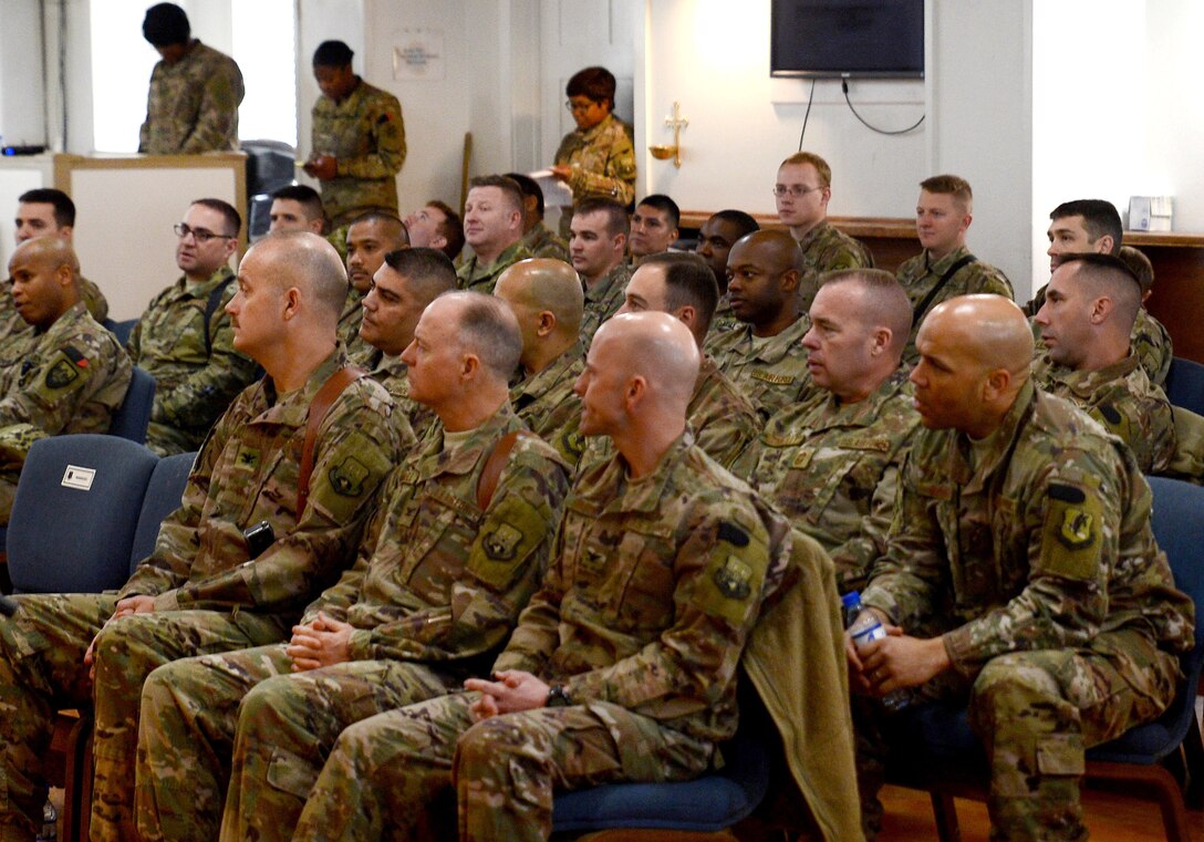 Service members gathered and listen to speeches at the Enduring Faith Chapel to celebrate Martin Luther King Day.