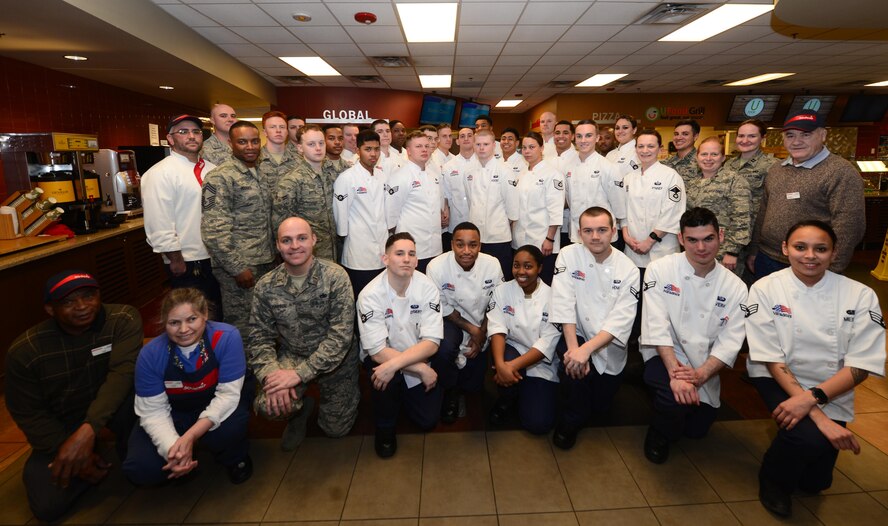 Food services personnel from the 28th Force Support Squadron stand together during a group photo inside the Raider Café at Ellsworth Air Force Base, S.D., Jan. 11, 2018.