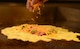 A ham and cheese omelet is prepared for a customer during the breakfast rush inside the Raider Café at Ellsworth Air Force Base, S.D., Jan. 12, 2018.