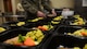 Airman Blake Stroh, a food services apprentice assigned to the 28th Force Support Squadron, prepares to-go boxes inside the Raider Café at Ellsworth Air Force Base, S.D., Jan. 12, 2018.