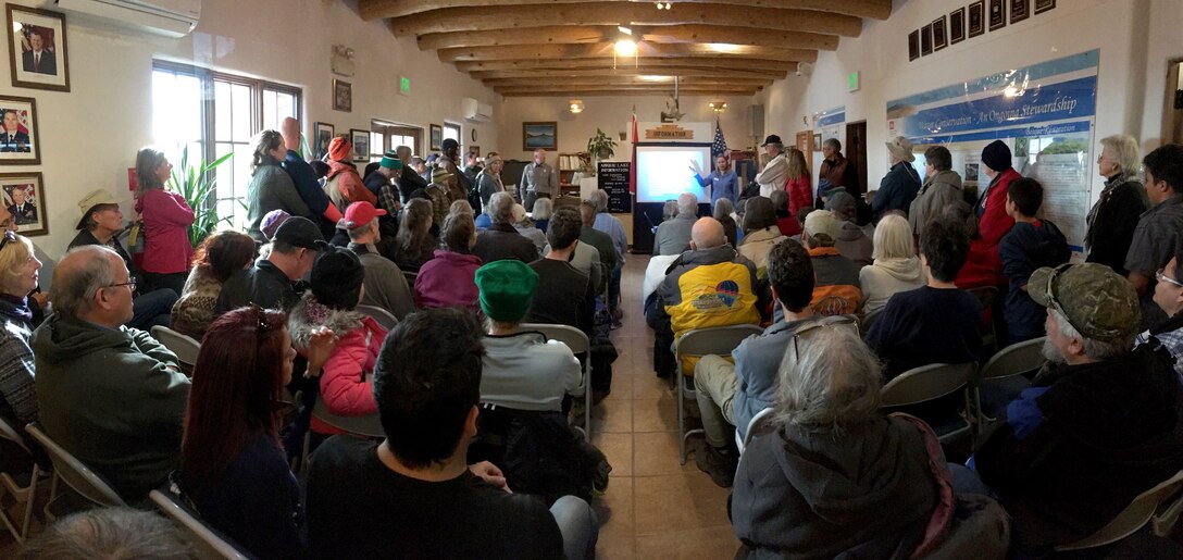 Volunteers for Abiquiu Lake's annual Midwinter Eagle Watch listen to an introductory presentation from The Wildlife Center's representatives, Jan. 6, 2018, before heading out to the lake to count eagles.