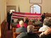 Senior Airman Timothy Bridges and Airman 1st Class Olivia Landry fold the U.S. flag at the memorial service for retired Chief Master Sgt. Billy Weathington in Newville, Alabama, Jan. 13, 2018. Weathington, age 87 at his passing on Jan. 1, 2018, was the security forces career field’s third chief master sergeant, ending his 27-year active duty career in 1979 as the senior enlisted advisor to Air Force Security Forces.  He continued to serve as the director of Plans and Security Acquisitions, U.S. Air Force, retiring in 1990. The folded U.S. flag was presented to Weathington’s wife of 67 years, Christine. Joining Bridges and Landry in the 42nd SFS flag detail at the memorial service were Staff Sgt. Mitchell Wright and Senior Master Sgt. Jeffrey Tobin. (Courtesy photo)