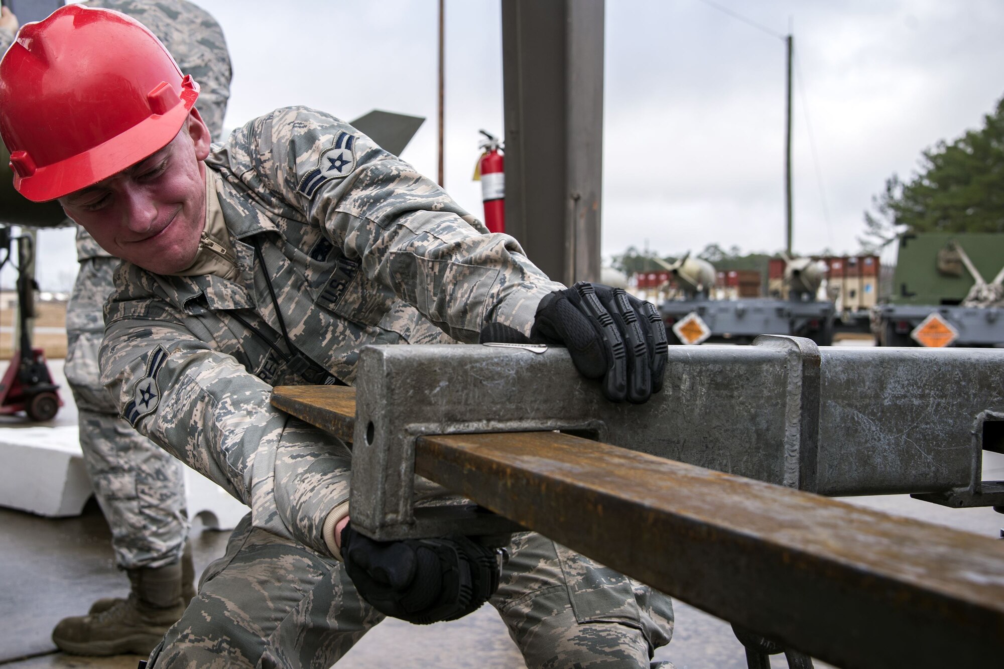Airman 1st Class Colten Carey, 23d Maintenance Squadron (MXS) precision guided munitions technician, pulls the hardback adapter off of a forklift Jan. 11, 2018, at Moody Air Force Base, Ga. The 23d MXS held a combat munitions class to help acclimate and improve their Airmen’s readiness to perform well in a deployed environment.   (U.S. Air Force photo by Airman Eugene Oliver)