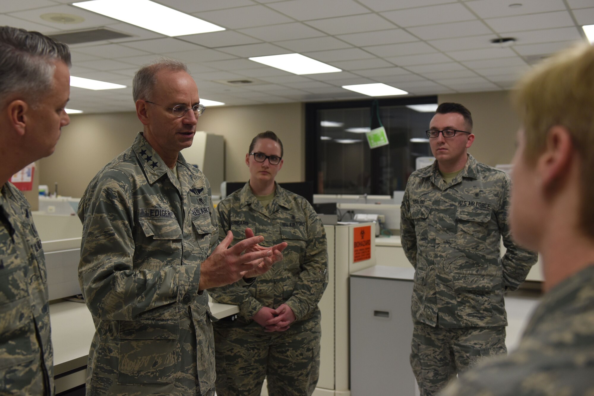 Lt. Gen. Mark Ediger, U.S. Air Force Surgeon General, speaks with 92nd Medical Group Airmen during his visit to Fairchild Air Force Base, Washington, Jan. 11, 2018. Ediger spoke of innovative ways to improve the performance and quality of the Military Health System GENISIS program, a Department of Defense electronic healthcare record system. (U.S. Air Force photo/Airman Whitney Laine)