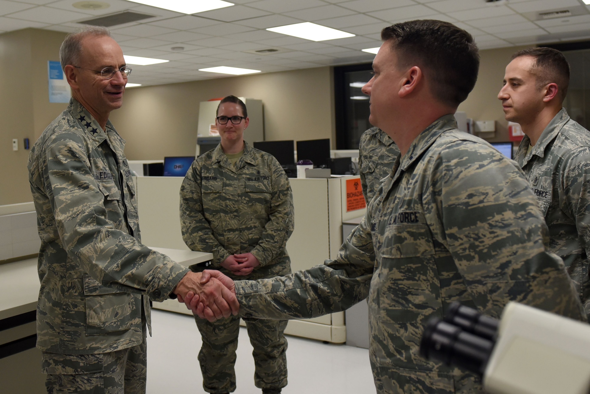 Lt. Gen. Mark Ediger, U.S. Air Force Surgeon General, meets with 92nd Medical Group Airmen during his visit to Fairchild Air Force Base, Washington, Jan. 11, 2018. The 92nd MDG was the first to implement the MHS GENISIS as their primary patient care and record-keeping program. (U.S. Air Force photo/Airman Whitney Laine)