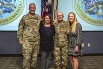 Col. Scott Grammer and his wife and daughter pose with Maj. Gen. Richard Gallant, commander, Joint Task Force Civil Support, during his promotion ceremony to Colonel , January 11, 2017.