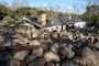 Boulders from a mudslide surround a damaged home on Glen Oaks Road in Montecito, California on Jan. 10