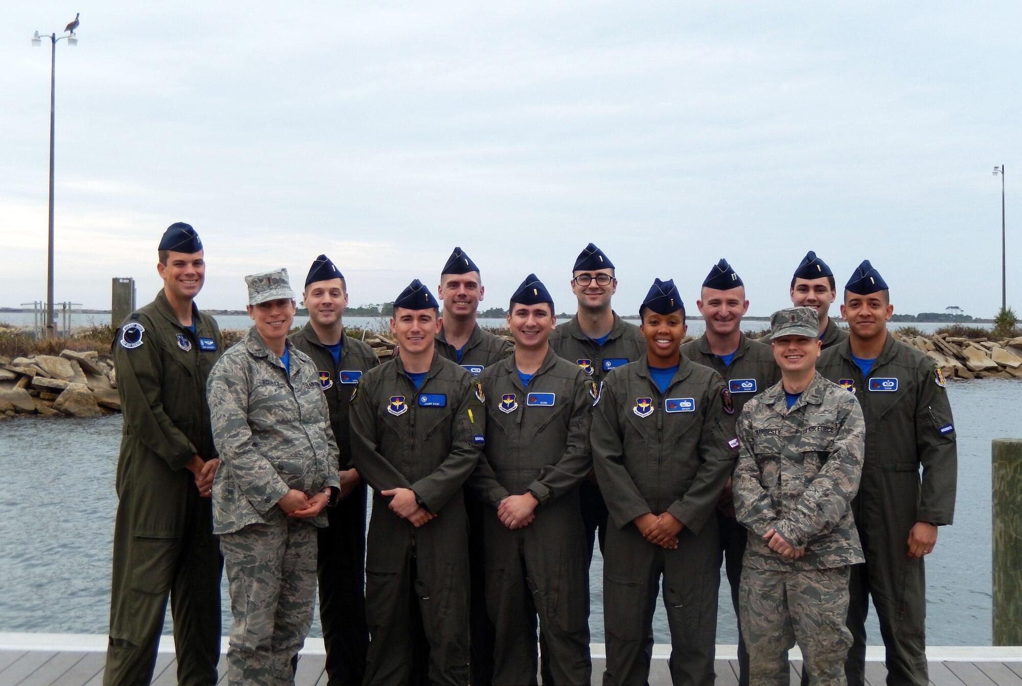 Airmen posing for group photo.