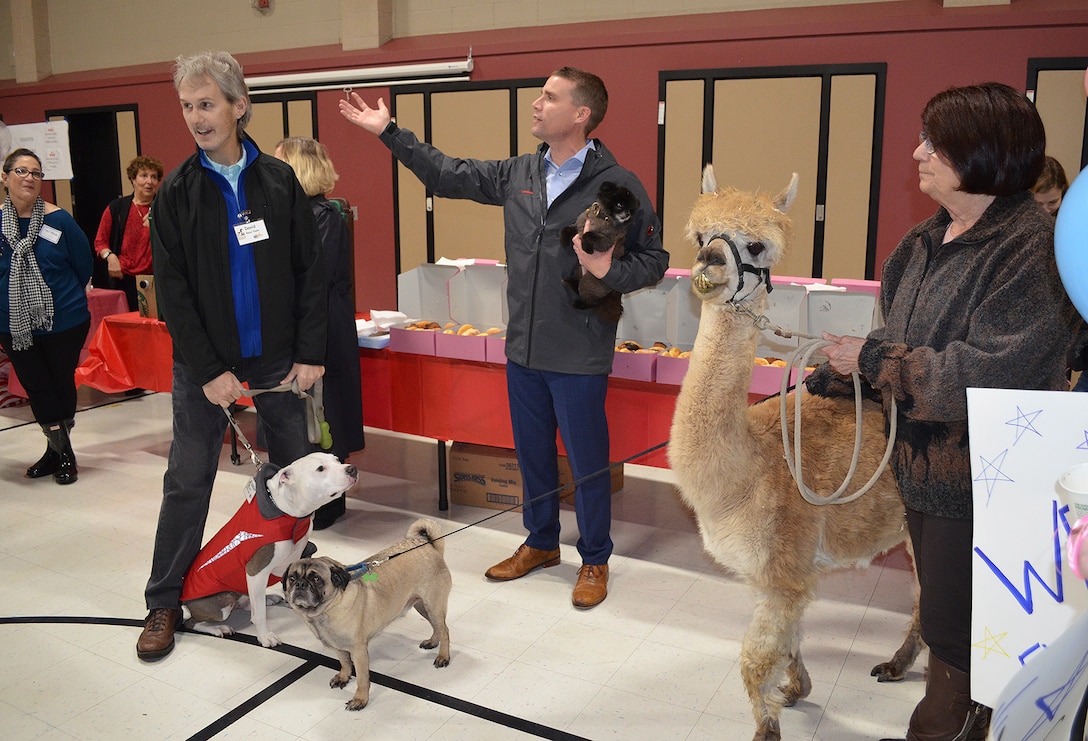 Comfort animals, including an alpaca named O'Malley, were among those welcoming Schaefer Elementary School students in Coffey Park back to school after a three-month absence due to the October 2017 wildfires that swept through the community.