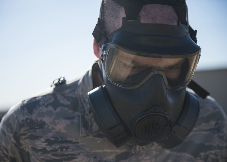 An Airman assigned to Altus Air Force Base, Okla., practices safely removing his Mission Oriented Protective Posture (MOPP) gear, Jan. 10, 2018, at Altus AFB.