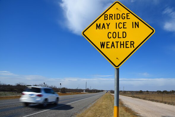 A vehicle travels west on U.S. Highway 90 outside Laughlin Air Force Base, Texas, Jan. 11, 2018. With colder weather on the way, Laughlin personnel are encouraged to take safety precautions while driving throughout the winter. (U.S. Air Force photo/Airman Marco A. Gomez)