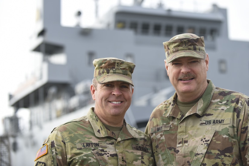 U.S. Army Chief Warrant Officer 2 Nathaniel Layton, 97th Transportation Company, 7th Transportation Brigade (Expeditionary) chief engineer, and Chief Warrant Officer 5 Patrick May, Office of the Chief of Transportation chief maritime qualification director, only met once growing up, today they are closer than ever and owe this to the Army.