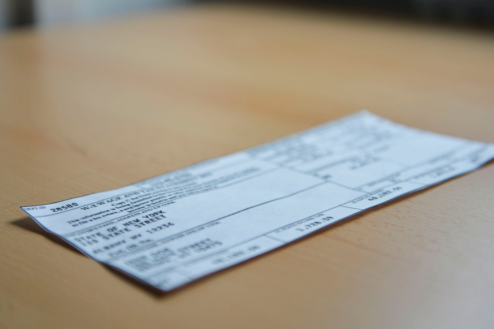 A sample W-2 lies on a desk on Ramstein Air Base, Germany, Jan. 12, 2018. The 86th Airlift Wing legal office is scheduled to provide military members of certain pay grades with tax return assistance from Feb. 5 until June 15. (U.S. Air Force photo by Airman 1st Class Joshua Magbanua)