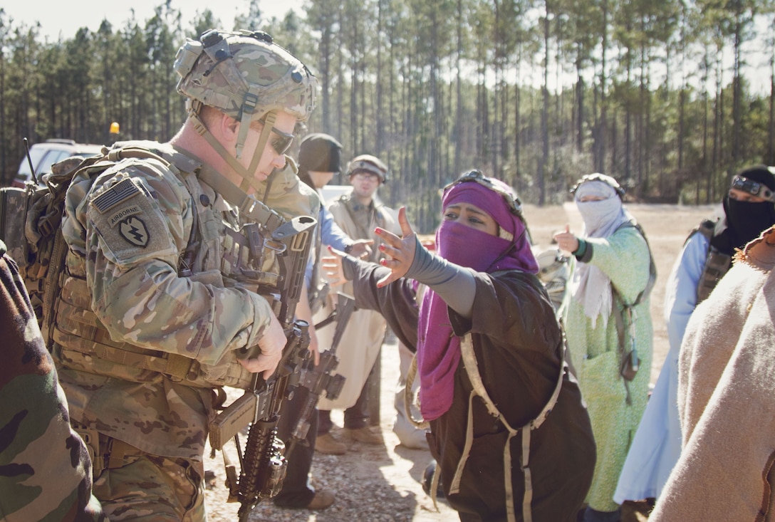 Capt. Christopher Young, a combat advisor team leader for the 2nd Battalion, 1st Security Force Assistance Brigade, engages with a local civilian role player during the unit’s rotation at the Joint Readiness Training Center at Fort Polk, La., Jan. 15, 2018. The JRTC rotation was conducted in order to prepare the newly formed 1st SFAB for an upcoming deployment to Afghanistan in the spring of 2018. SFABs provide combat advising capability while enabling brigade combat teams to prepare for decisive action, improving readiness of the Army and its partners. (U.S. Army photo by Staff Sgt. Sierra A. Melendez, 50th Public Affairs Detachment, 3rd Infantry Division Public Affairs)