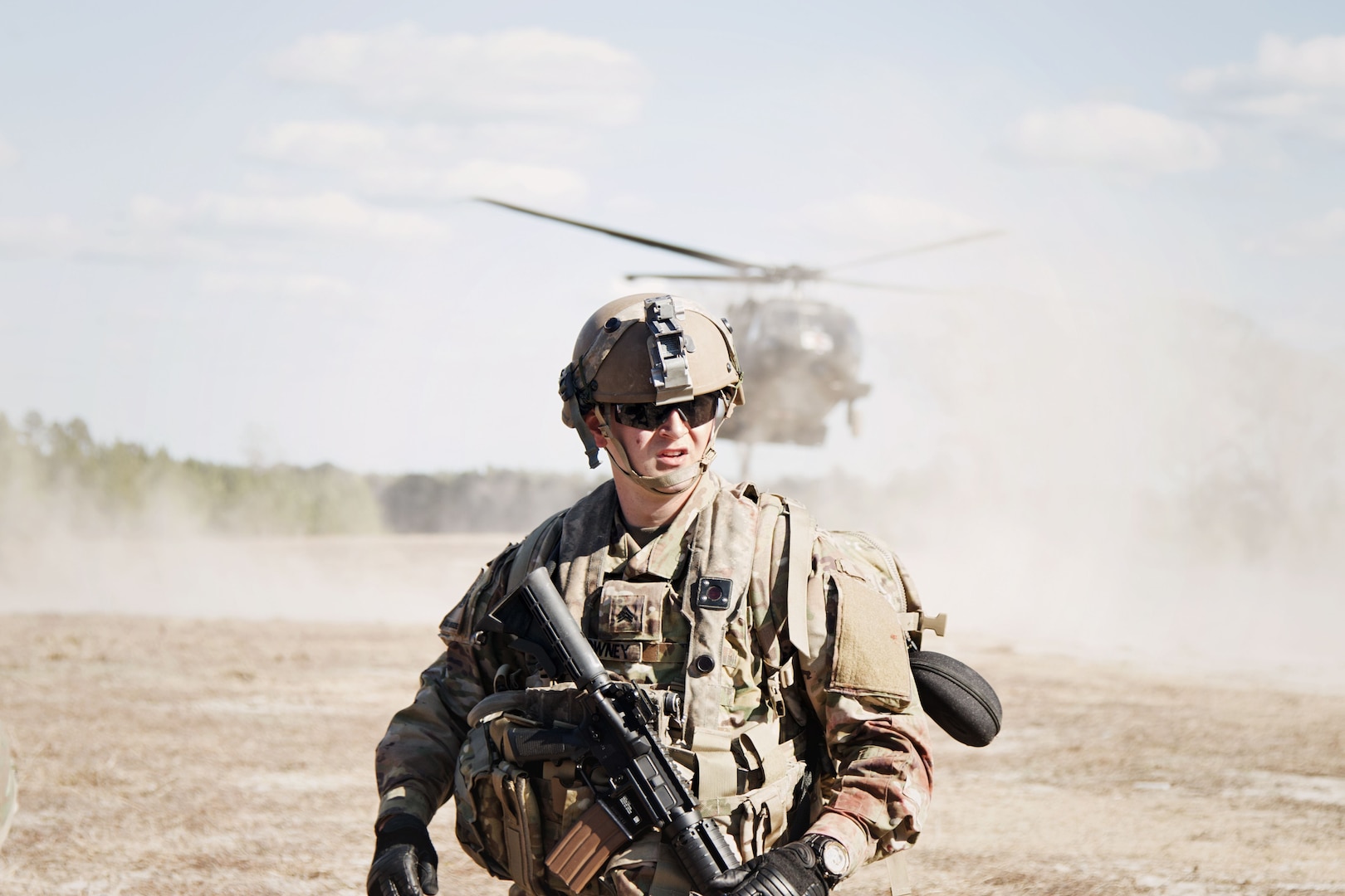 Sgt. Zachary Downey, a combat advisor team medic assigned to 2nd Battalion, 1st Security Force Assistance Brigade and Columbus, Ohio native, prepares to evacuate a simulated casualty during the unit’s rotation at the Joint Readiness Training Center at Fort Polk, La., Jan. 15, 2018. The JRTC rotation was conducted in order to prepare the newly formed 1st SFAB for an upcoming deployment to Afghanistan in the spring of 2018. SFABs provide combat advising capability while enabling brigade combat teams to prepare for decisive action, improving readiness of the Army and its partners. (U.S. Army photo by Staff Sgt. Sierra A. Melendez, 50th Public Affairs Detachment, 3rd Infantry Division Public Affairs)