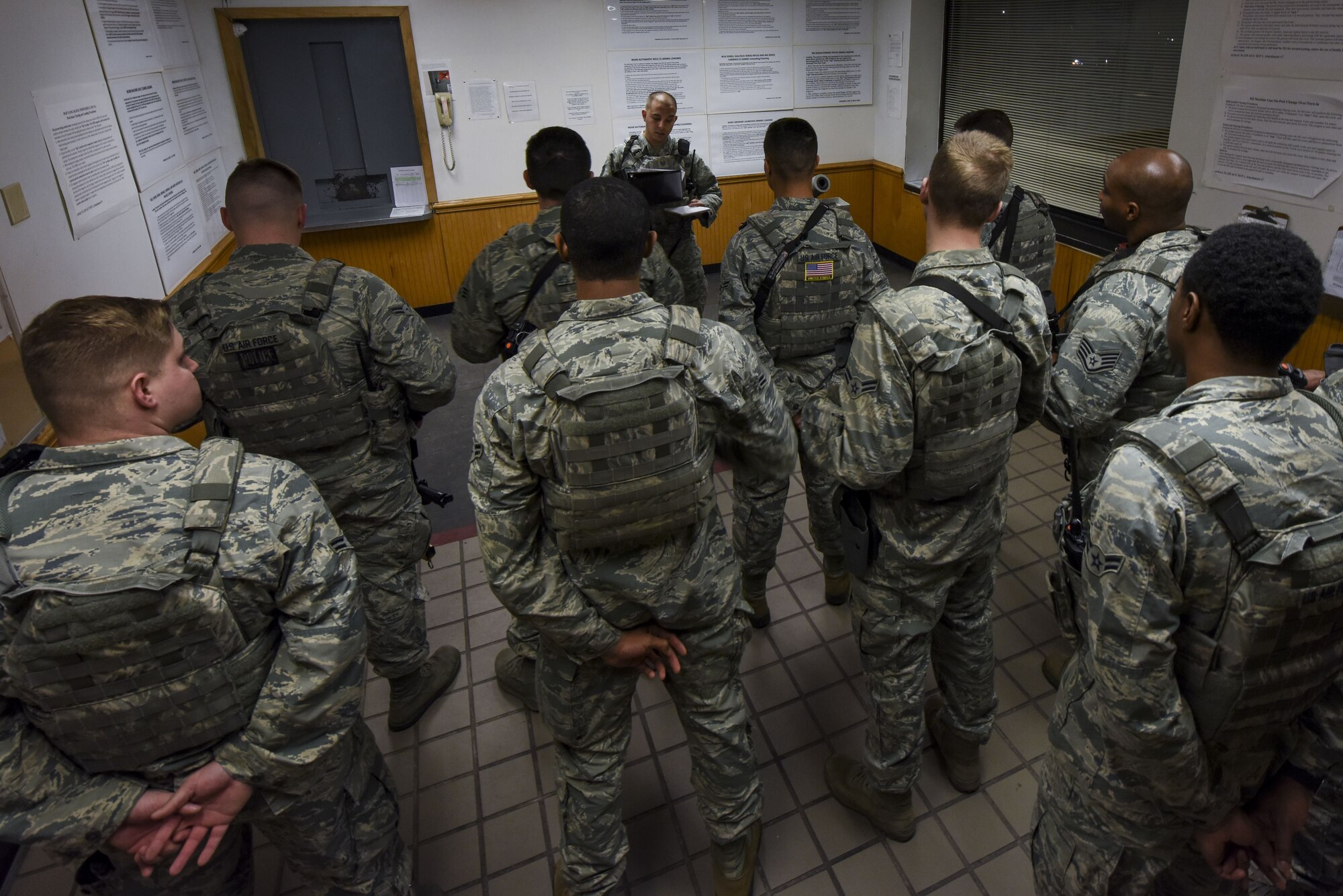 Members of the 4th Security Forces Squadron conduct an intelligence brief prior to setting out for their positions during exercise Thunderdome 18-01, Jan. 11, 2018, at Seymour Johnson Air Force Base, North Carolina. The exercise tested the squadron’s ability to defend the base from a myriad of simulated attacks and react to different scenarios that they could come across in a deployed environment. (U.S. Air Force photo by Staff Sgt. Brittain Crolley)