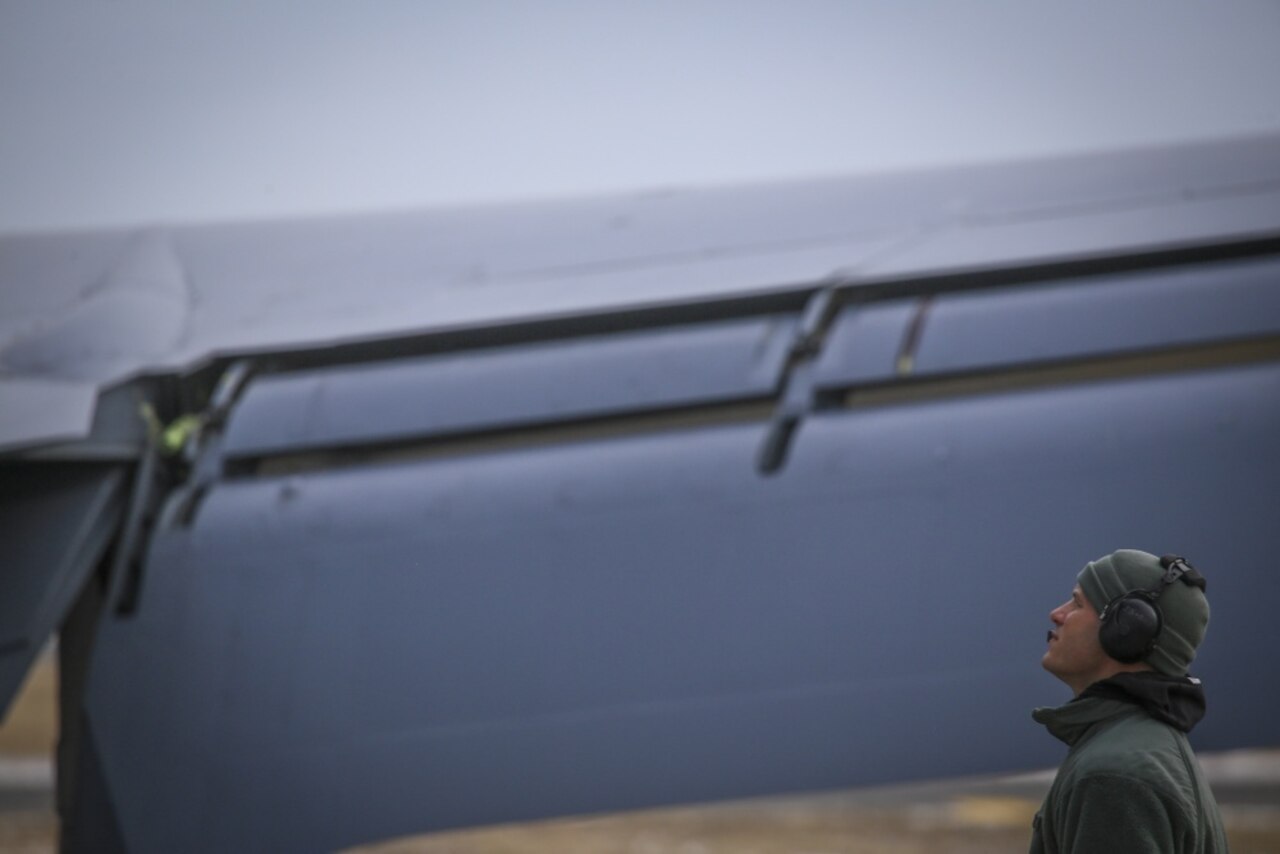 New Jersey Air National Guard Staff Sgt. Robert Cento does preflight checks on a 108th Wing KC-135R Stratotanker prior to a training flight on Joint Base McGuire-Dix-Lakehurst, N.J.