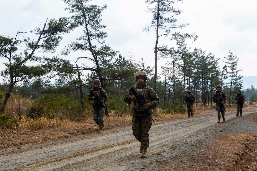 Marines participate in patrol zone reconnaissance training.