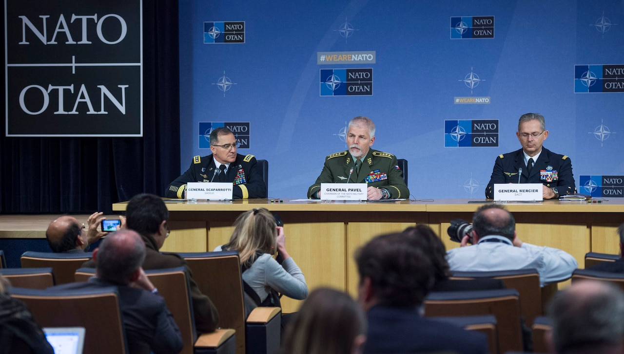 Czech Gen. Petr Pavel, center, the chairman of NATO’s Military Committee, responds to a question during a news conference at NATO headquarters in Brussels after a meeting of the alliance’s Military Committee.