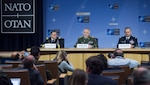 Czech Gen. Petr Pavel, center, the chairman of NATO’s Military Committee, responds to a question during a news conference at NATO headquarters in Brussels after a meeting of the alliance’s Military Committee.