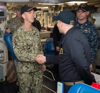 Chief of Naval Operations Adm. John Richardson speaks to Main Propulsion Assistant Lt. jg. Tony Diaz aboard USS Gridley (DDG 101) during a tour of the ship’s engine room after an all-hands call at Naval Station Everett, Wash. The purpose of the all-hands call was to talk about the importance of behavior, technical competence and character.