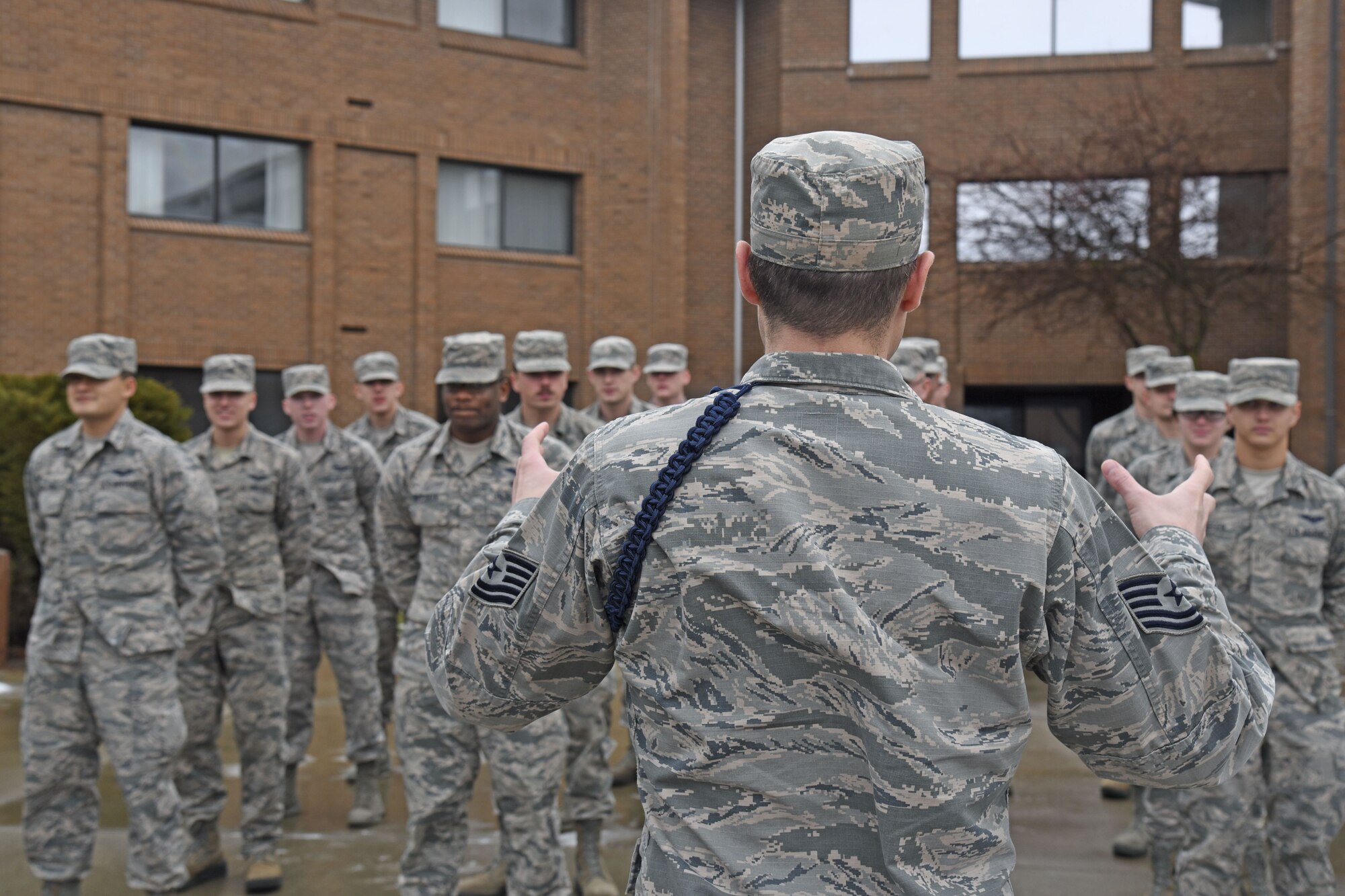 Tech. Sgt. Joshua Pagel, 66th Training Squadron military training leader flight chief, talks with students during formation Jan. 16, 2018, at Fairchild Air Force Base, Washington. Pagel is one of five MTLs assigned to the 66th TRS to assist transitioning Airmen between Basic Military Training and their first duty stations. (U.S. Air Force photo/Senior Airman Mackenzie Richardson)