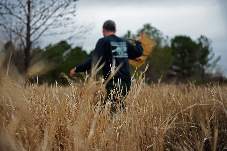 Hutch Collins threatened and endangered species biologist, walks away without catching any tiger salamanders at Poinsett Electronic Combat Range near Wedgefield, S.C., Jan. 11, 2018.