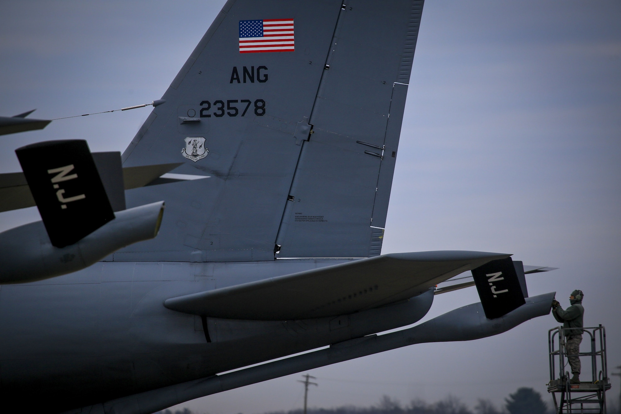 New Jersey Air National Guard Tech. Sgt. Raymond DeMarco troubleshoots lights on the refueling boom on a KC-135R Stratotanker from the 108th Wing on Joint Base McGuire-Dix-Lakehurst, N.J., Jan. 11, 2018. DeMarco is a KC-135R crew chief. (U.S. Air National Guard photo by Master Sgt. Matt Hecht)