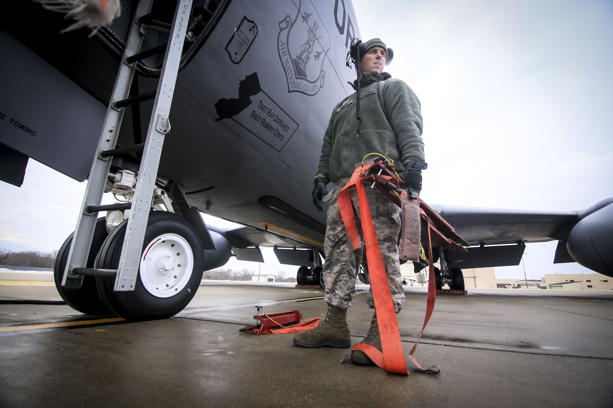 New Jersey Air National Guard Staff Sgt. Robert Cento pulls red tags during pre-flight checks on a 108th Wing KC-135R Stratotanker prior to a training flight on Joint Base McGuire-Dix-Lakehurst, N.J., Jan. 11, 2018. (U.S. Air National Guard photo by Master Sgt. Matt Hecht)