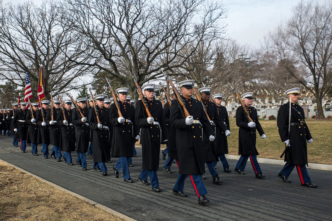 Marines with Alpha Company, Marine Barracks Washington D.C., march in formation during a full honors funeral for Maj. Gen. Paul A. Fratarangelo at Arlington National Cemetery, Arlington, Va., Jan. 16, 2018.  Fratarangelo served his final active duty assignment as Commander, Marine Corps Air Bases, Western Area. (Official U.S. Marine Corps photo by Cpl. Robert Knapp/Released)