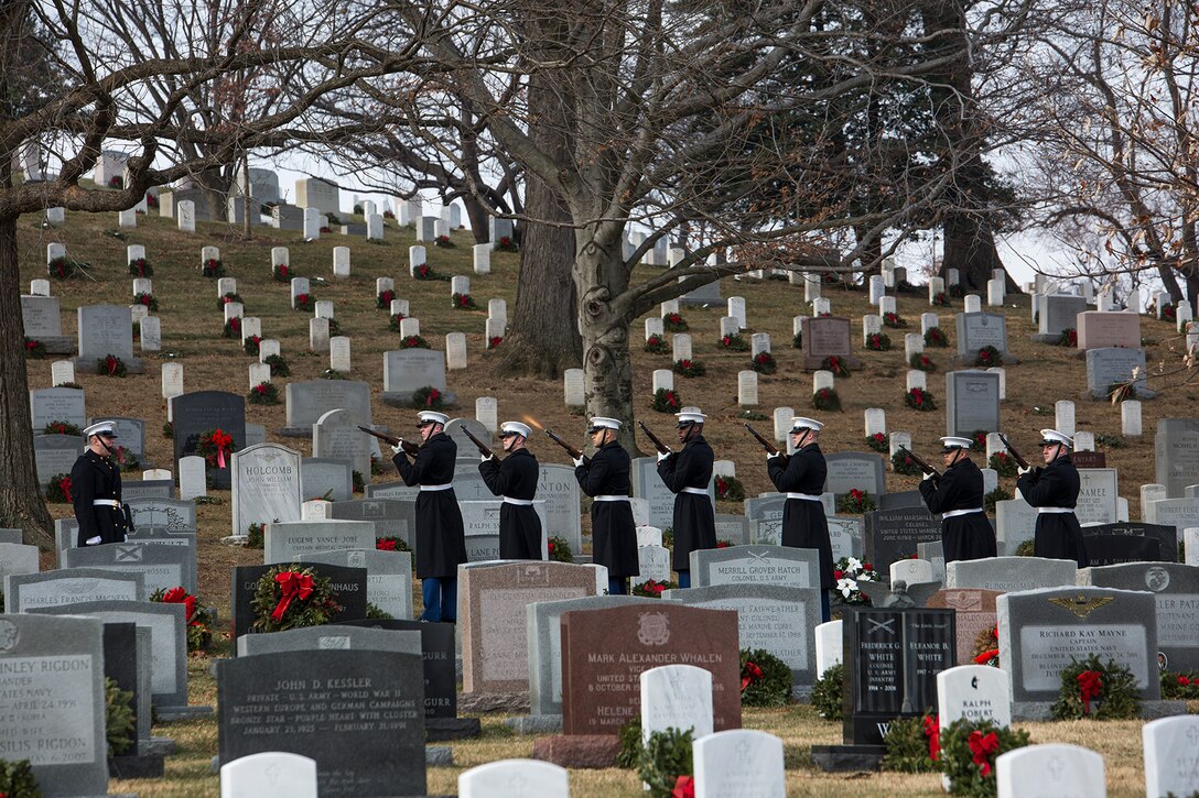 Marines with the Bravo Company firing party, Marine Barracks Washington D.C., render a three-volley salute during a full honors funeral for Maj. Gen. Paul A. Fratarangelo at Arlington National Cemetery, Arlington, Va., Jan. 16, 2018.  Fratarangelo served his final active duty assignment as Commander, Marine Corps Air Bases, Western Area. (Official U.S. Marine Corps photo by Cpl. Robert Knapp/Released)