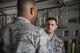 Senior Master Sgt. Brandon Vath, 15th Aircraft Maintenance Squadron superintendent, briefs Chief Master Sgt. Anthony Johnson, Pacific Air Forces command chief, during a tour of the units at Joint Base Pearl Harbor-Hickam, Hawaii, Jan. 16, 2018.  During his tour, Johnson spoke about the importance of readiness and Air Force policy changes. (U.S. Air Force photo by Tech. Sgt. Heather Redman)