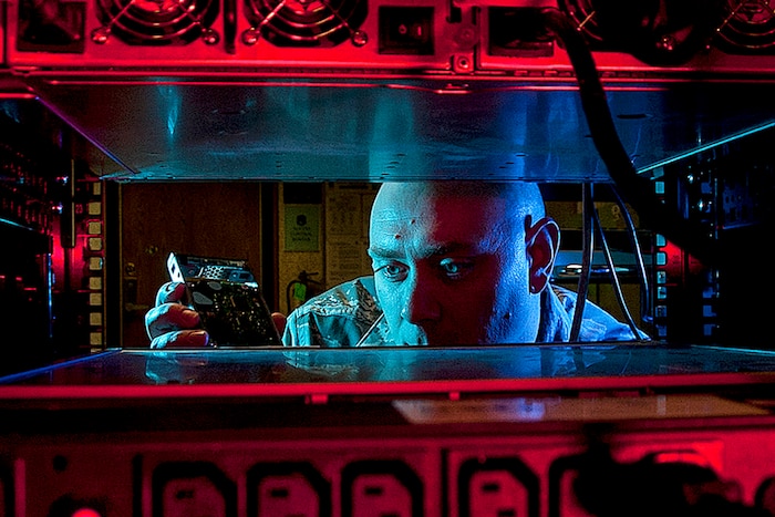 An airman prepares for a command cyber readiness inspection.