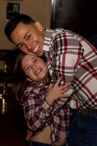 Dads, daughters saddle up to dance night away